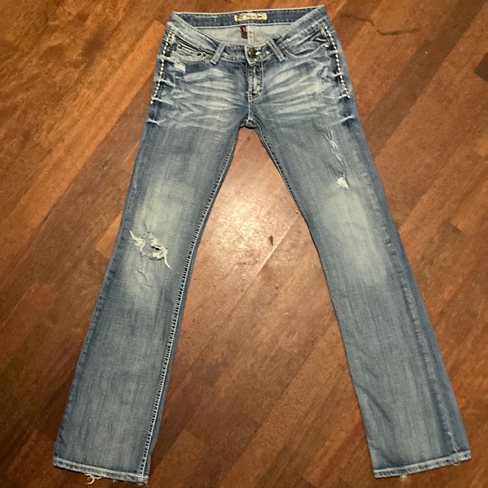 Ultra low rise distressed bootcut BKE jeans